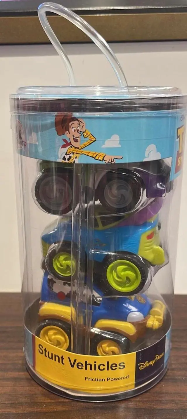 Main image of Disney Parks Pixar Toy Story Stunt Vehicles Friction Powered New with Box