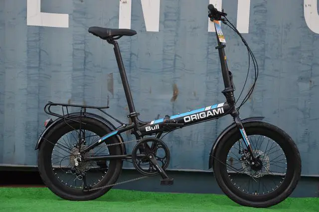 Alt view image 2 of 5 - The Origami Bull is our go anywhere, any road, no nonsense folding bike.  It has an aluminum frame, 9-speeds, disc brakes, fat 20x2.125 tires, Sensah derailleur, and 300 lb. capacity. Black/Blue