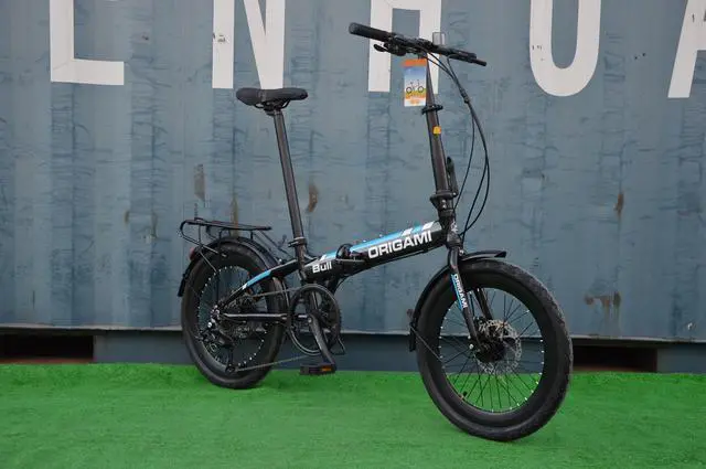 Alt view image 3 of 5 - The Origami Bull is our go anywhere, any road, no nonsense folding bike.  It has an aluminum frame, 9-speeds, disc brakes, fat 20x2.125 tires, Sensah derailleur, and 300 lb. capacity. Black/Blue