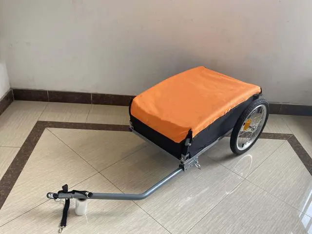 Main image of The Origami folding utility trailer has capacity for four large grocery bags and folds flat with no tools required.  It is perfect for you RV or Boat, or just that trip to the grocery store.