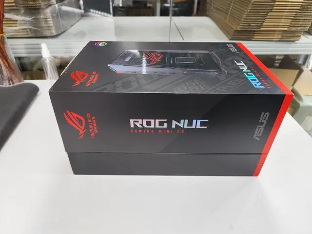 Main image of ASUS ROG NUC (2025) Gaming Mini PC, Intel Core Ultra 9 275HX, NVIDIA GeForce RTX 5070Ti 12GB GDDR7, 32GB DDR5 RAM, 1TB NVMe SSD, Thunderbolt 4 Triple-Fan Cooling and ARGB Lighting