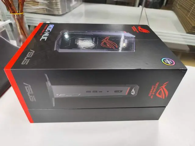 Main image of ASUS ROG NUC (2025) Gaming Mini PC, Intel Core Ultra 9 275HX, NVIDIA GeForce RTX 5080 16GB GDDR7, 32GB DDR5 RAM, 1TB NVMe SSD, Thunderbolt 4, Triple-Fan Cooling, and ARGB Lighting