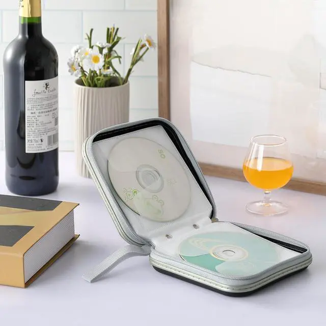 Alt view image 6 of 7 - JINLIFA CD DVD Case Holder, 40 Capacity CD/DVD Case Holder Organizer Book Wallet for Car, Travel, Home (Stylish Design)