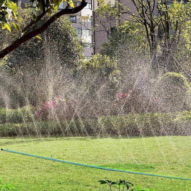 Alt view image 6 of 6 - Sprinkler Hose 100FT, Heavy Duty Watering Hoses, Efficient Irrigation Tubing for Garden Lawn Sprinklers System with 40 Pack Staples