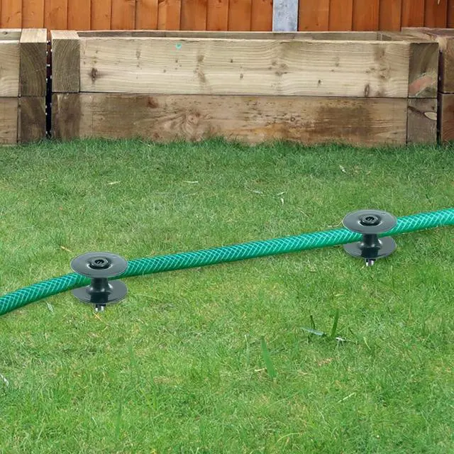 Alt view image 3 of 3 - Coloch 6 Pack Hose Guard Stake, 10 Inch Garden Hose Guide Spike Zinced Metal Spike with Heavy Spin Top, Keep Garden Hose Out of Flower Beds for Plant Protection, Greenhouse, Yard Lawn