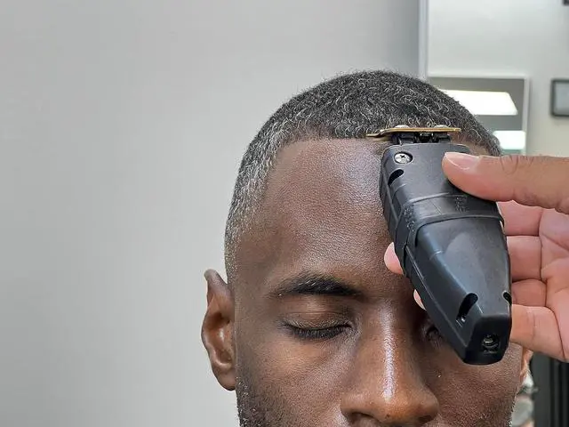 Alt view image 3 of 7 - Andis 74150 GTX-EXO Professional Cord/Cordless Lithium-ion Electric Beard & Hair Trimmer with Charging Stand, Black