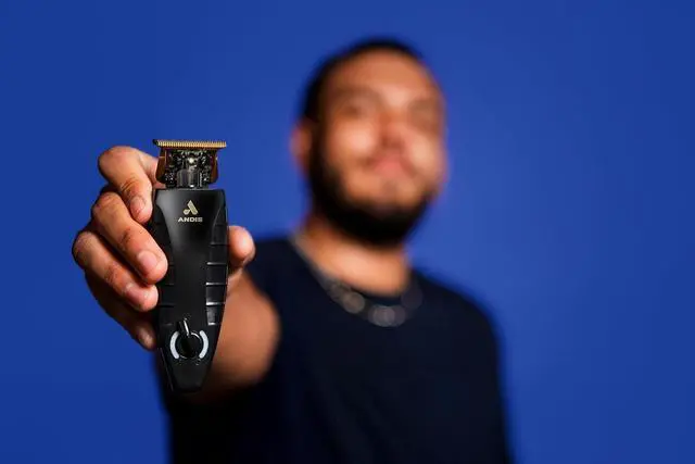 Alt view image 4 of 7 - Andis 74150 GTX-EXO Professional Cord/Cordless Lithium-ion Electric Beard & Hair Trimmer with Charging Stand, Black