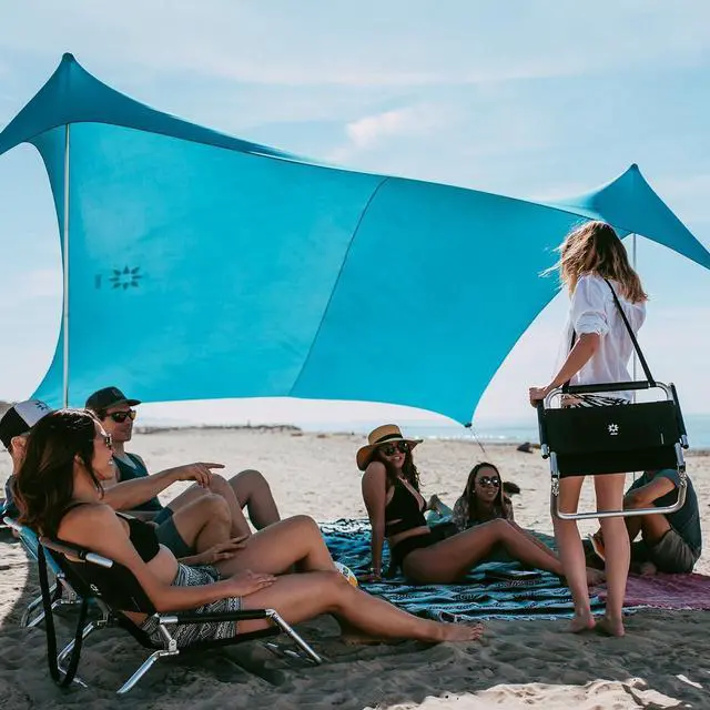Main image of Neso Gigante - Portable Beach Tent - Ideal to Enjoy with Family and Friends - UPF 50+, Water-Resistant, and Lightweight - Teal, 11' x 11'