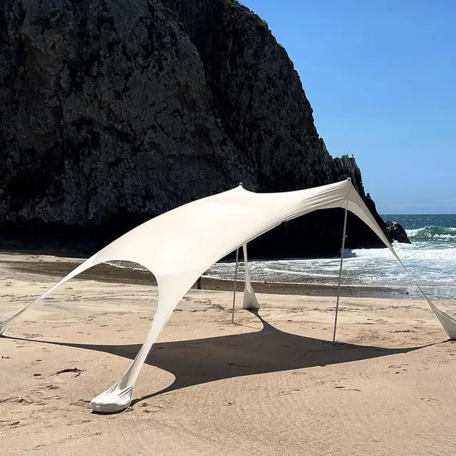 Main image of Beach Shade Sun Shelter by Skybed with Built-in Sand Bags - Lightweight, Durable, Small Pack Size - Fits in Carry-On Luggage - Easy, Simple Setup (Large (7'x7' - 70" Poles), Sand Dollar)