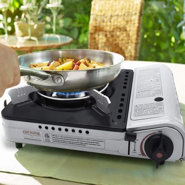 Alt view image 3 of 5 - Chef Master 90235 Butane Countertop Stove Combination Pack | Includes 4 x 8 oz. Tins of Butane Fuel | 12,000 BTU | Portable, with Carry Case | 1 Click Ignition | Double Wind Guard