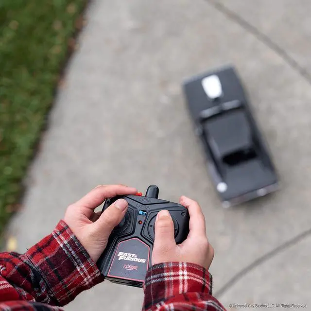 Alt view image 3 of 7 - Jada Toys Fast & Furious 1:16 1970 Dodge Charger RT Remote Control Car 2.4 GHz Black, Toys for Kids and Adults, Glossy Black (97584)