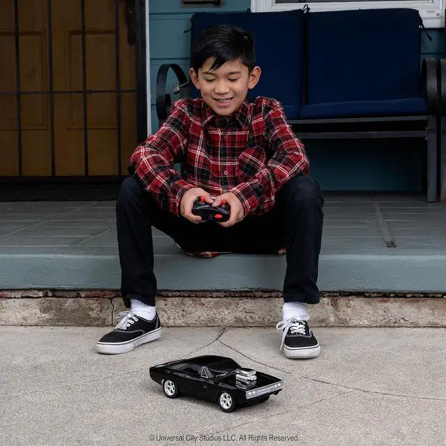 Alt view image 4 of 7 - Jada Toys Fast & Furious 1:16 1970 Dodge Charger RT Remote Control Car 2.4 GHz Black, Toys for Kids and Adults, Glossy Black (97584)