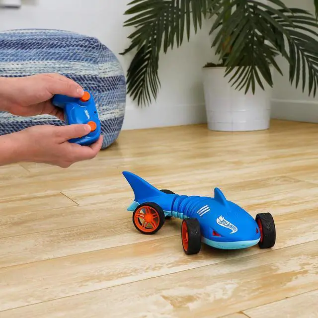 Alt view image 2 of 6 - Hot Wheels RC Toy Car, Remote-Control Shark Speeder in 1:15 Scale That Bends, Turns & Slides Like a Mutant Machine, Features Lights & Sounds