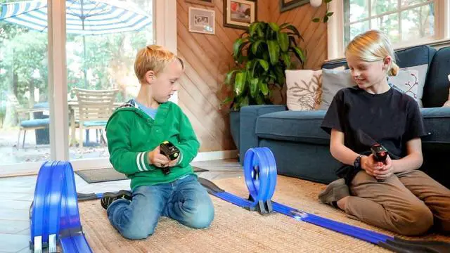 Alt view image 5 of 7 - Remote Control Cordless Glow in The Dark High-Speed Super Loop Speedway Track Set with Two Cars for Dual Racing, Glow Blue
