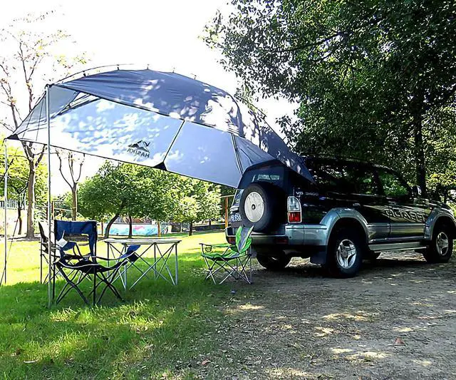 Alt view image 7 of 7 - Versatility Teardrop Awning for SUV RVing, Car Camping, Trailer and Overlanding Light Weight Truck Canopy Durable Tear Resistant Tarp with 2 Sandbag