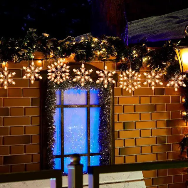 Alt view image 4 of 7 - Snowflake Christmas String Lights - 2 Pack 6 Drops 8.8 Ft. 100 Mini Bulb Snowflake Icicle Lights with Hooks Connectable Hanging Lights for Xmas Rooftop Home Indoor Outdoor Party Wedding