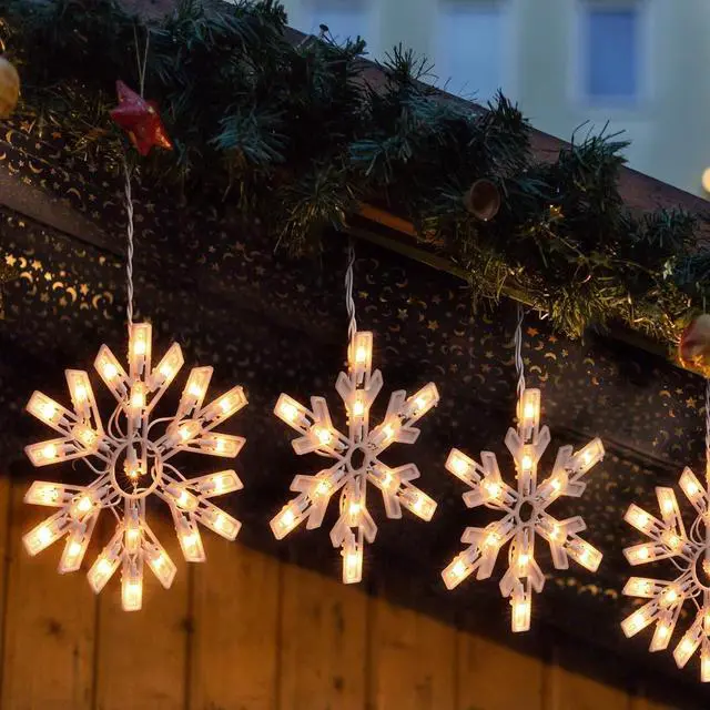 Alt view image 7 of 7 - Snowflake Christmas String Lights - 2 Pack 6 Drops 8.8 Ft. 100 Mini Bulb Snowflake Icicle Lights with Hooks Connectable Hanging Lights for Xmas Rooftop Home Indoor Outdoor Party Wedding