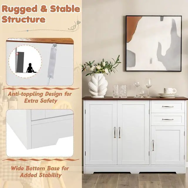 A kitchen cabinet with a dark wood top and white doors and drawers.