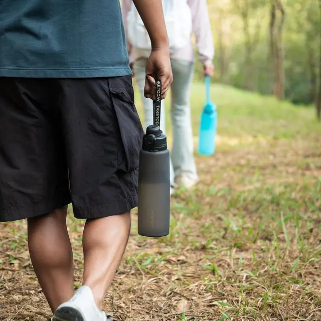 Alt view image 6 of 7 - Collapsible 32oz Silicone Water Bottle, Foldable Travel Bottle with Strap, BPA Free, Leakproof for Hiking, International Travel, Outdoors (Black)