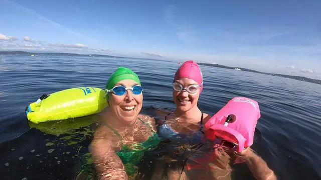 Alt view image 3 of 7 - New Wave Swim Buoy for Open Water Swimmers and Triathletes - Light and Visible Float for Safe Training and Racing - High Visiblity Fluo Green