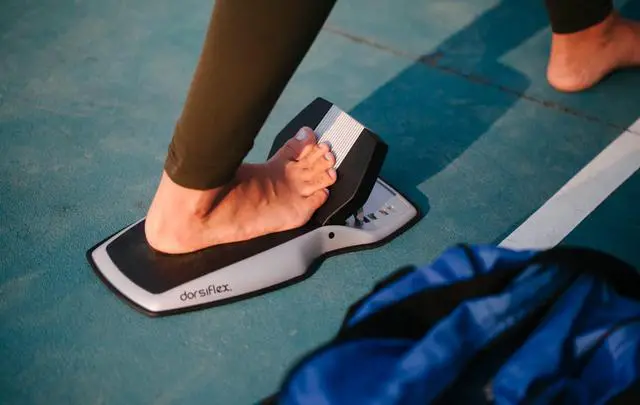 Alt view image 4 of 6 - Dorsiflex. Deep calf, foot, and arch stretcher and foot rocker and slant board device for plantar fasciitis, Achilles tendinitis, calf stretching, ankle mobility, toe mobility and heel pain relief.