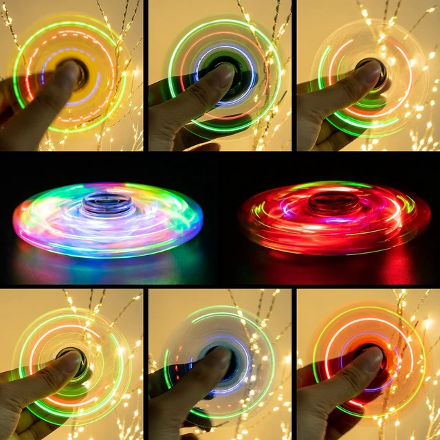 Alt view image 6 of 7 - (6 Pack) LED Light Up Glow in the Dark Fidget Spinner Toy Rainbow Finger Toy