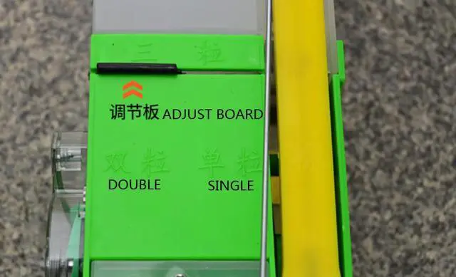 Alt view image 6 of 7 - Fertilizing and seeding machine portable planter sowing corn peanut soybean vegetable hand - held planter manual adjustable seeder & fertilizer Spreader