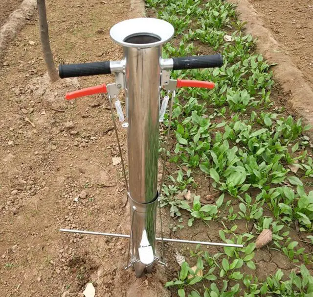 Alt view image 2 of 7 - Seedling Transplanting Tool Stainless Steel Bulb Planter Tool,Multi-Functional Vegetable Seedling Transplanter Manual Hand-Held Young Plant Garden Greenhouse with Pedal(Double Handle)