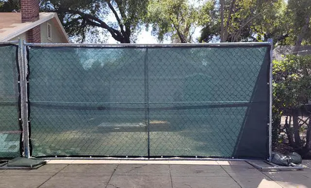 Alt view image 2 of 5 - Windscreen Supply Co. Heavy Duty Mesh Privacy Fence Panel Screen 6 ft. x 12 ft. 85% Blockage Green - PS0612GRN