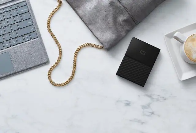 Alt view image 2 of 4 - Western Digital 4TB Black My Passport Portable External Hard Drive - USB 3.0 - WDBYFT0040BBK-WESN