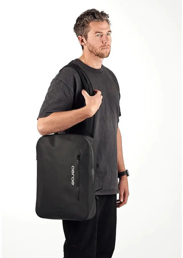 Alt view image 5 of 5 - aeroe QuickLock Urban Backpack  360° Rotation 10L Low Profile Bag  Fits 16" Standard Laptop | 100% Waterproof IP 64 | QuickLock Puck Attachment  Magnetic Buckles