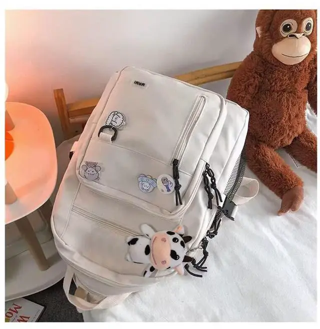 Alt view image 2 of 5 - SPORTBANG Cute Aesthetic Backpack for teen girls middle school Bag Student Laptop White Backpacks With Cute pin accessories (White, One Size)