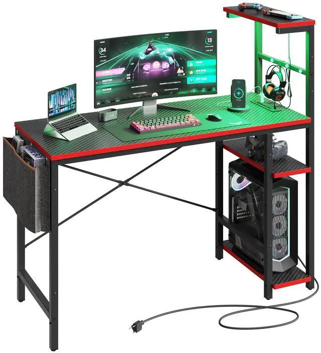 Alt view image 6 of 7 - Bestier Gaming Desk with Power Outlets, 44 Inch Led Gamer Desk with 4 Tiers Reversible Shelves, PC Gaming Table with Headset Hook & Side Storage Bag for Bedroom (Black 3D Carbon Fiber)