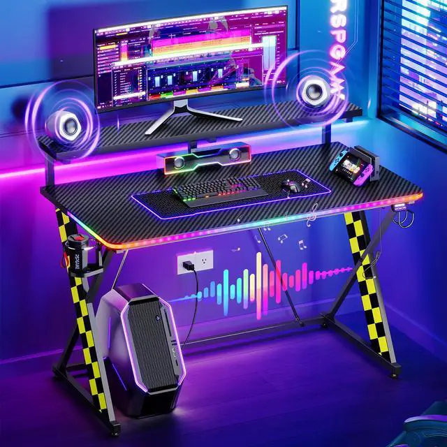 Alt view image 2 of 7 - RSPGAME Basic 43" Music Sync LED Gaming Desk with Dynamic Color-Changing & Racing Gear Style, X-Shape Ergonomic Monitor Stand Computer Desk with Cup Holder and Headset Hanger, Black & Yellow