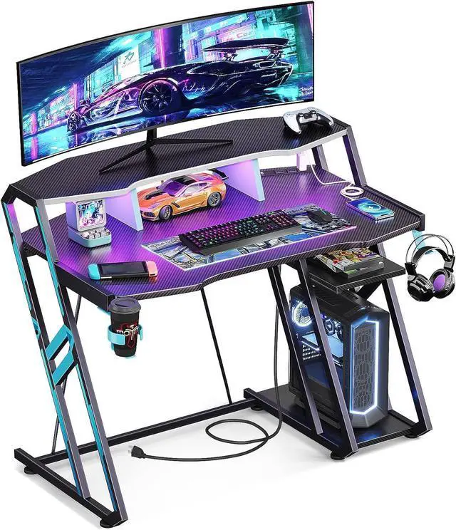 Main image of Gaming Desk with Power Outlet & LED Lights, Computer Desk 39inch with PC Storage Shelf, Gaming Table with Carbon Fiber Texture, Gamer Desk, Gift for Boys Men, Black