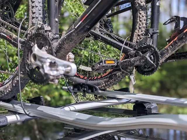 Alt view image 3 of 6 - Compact and Thin Bike Lock, Ultra-Secure Compact 4-Digit Combination Sliding Lock with 2 Metre Length Cable for Bike, Ski, Snowboard, Scooter and Pushchair, Silver