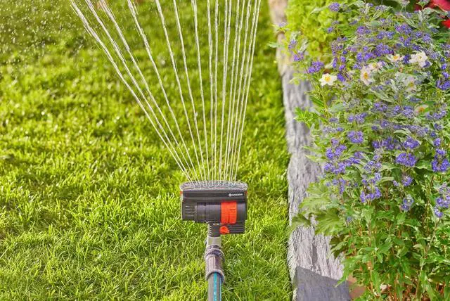 Alt view image 2 of 7 - 20575 | Up to 2300 sq ft - ZoomMaxx Adjustable Oscillating Sprinkler on Metal Step Spike for Watering Large Area Lawn with US Hose Threads, Yard and Garden. Quick Connects