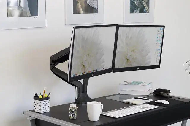 Alt view image 3 of 5 - Mount-It! Dual Monitor Arm Mount | Desk Stand | Two Articulating Gas Spring Height Adjustable Arms | Fits 2 x 24 27 29 30 32 Inch VESA 75 100 Compatible Screens | C-Clamp and Grommet Bases (Black)