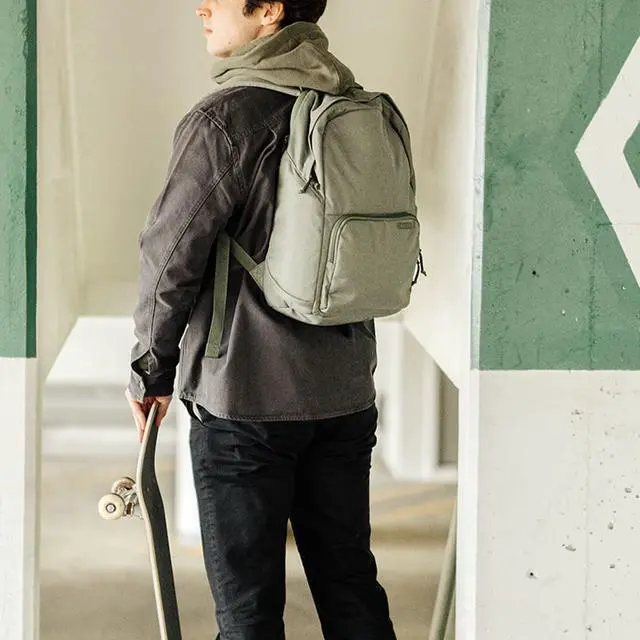 Alt view image 5 of 5 - The Brevite Backpack- Casual daypack backpacks for every function. Compact but spacious 18L aesthetic traveling backpack with laptop compartment. (Green)