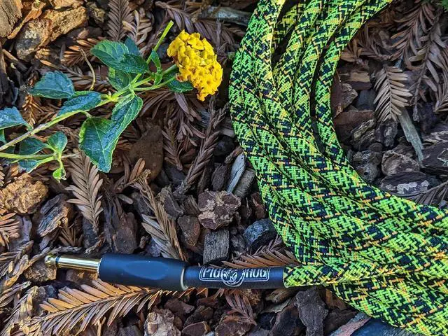 Alt view image 2 of 4 - Pig Hog PCH10GYW Yellow Graffiti High Performance Instrumental Cable 10-Feet Straight Unique Woven Outer Covering Gold Plated 1/4" Straight Connectors