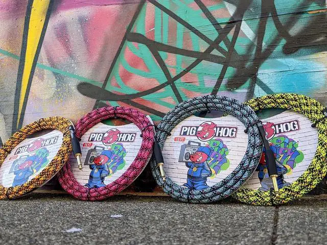 Alt view image 3 of 4 - Pig Hog PCH10GYW Yellow Graffiti High Performance Instrumental Cable 10-Feet Straight Unique Woven Outer Covering Gold Plated 1/4" Straight Connectors
