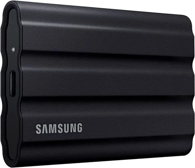 Main image of T7 Shield 1TB, up to 1050MB/s, USB 3.2 Gen2, Rugged, IP65 Rated, for Photographers, Content Creators and Gaming, Portable External Solid State Drive (MU-PE1T0S/AM, 2022), Black