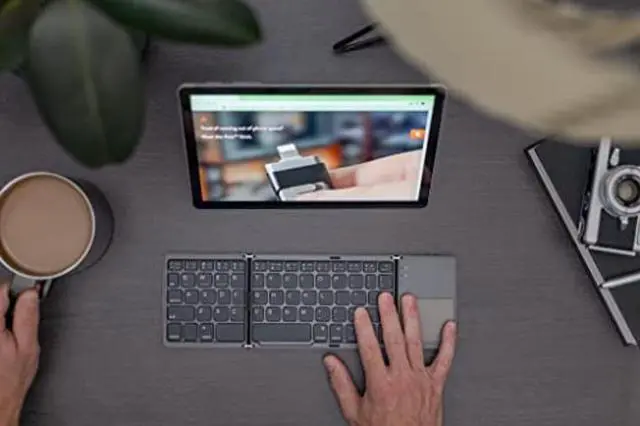Alt view image 3 of 5 - Ares Ultra Slim Pocket Foldable Bluetooth Wireless Keyboard with Touchpad (Silver)