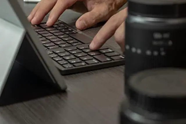 Alt view image 4 of 5 - Ares Ultra Slim Pocket Foldable Bluetooth Wireless Keyboard with Touchpad (Silver)