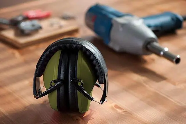 Alt view image 2 of 5 - Earmuff hearing protection with low profile passive folding design 26dB NRR and reduces up to 125dB , Army Green