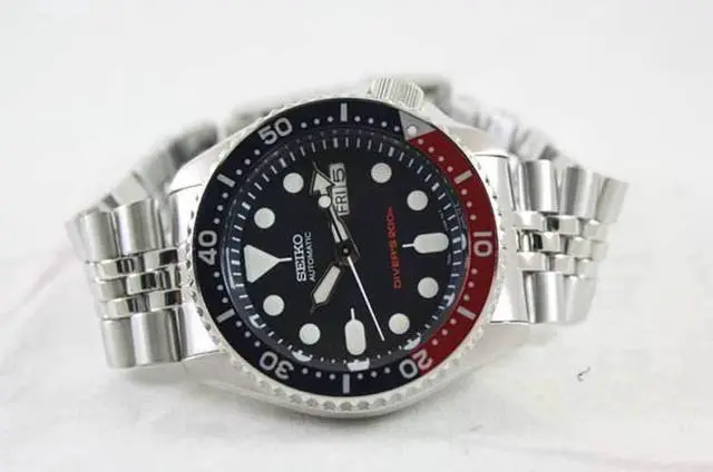 Alt view image 9 of 11 - Seiko Men's Automatic Black Dial Black Rubber Watch SKX007J1