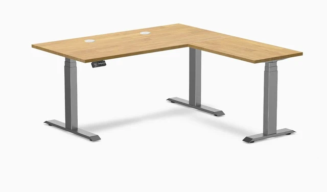 Main image of Desky Rubberwood L-Shape Sit Stand Desk - Light Oak / 60 x 30 x 62 x 20 in with Grommets / Space Gray