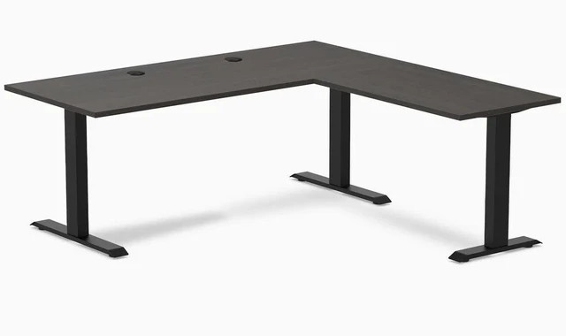 Main image of Desky Zero Laminate L-Shape Office Desk - Burnished Wood / 70.9 x 29.5 x 68.9 x 23.6 in with Grommets / Matte Black