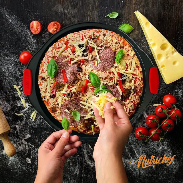 Alt view image 6 of 7 - NutriChef Non-Stick Pizza Tray with Silicone Handles, 4-Pack Round Steel Non-Stick Pans with Perforated Holes, Premium Bakeware, Pizza Trays with Silicone and Oversized Handles, Dishwasher Safe