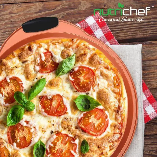 Alt view image 4 of 6 - NutriChef Non-Stick Pizza Pan, Flexible Carbon Steel with Black Silicone Handles, Copper Silicone Coating, 14.6'' x 13'' x 0.79'' - BKNCSBS52SPIZZAP